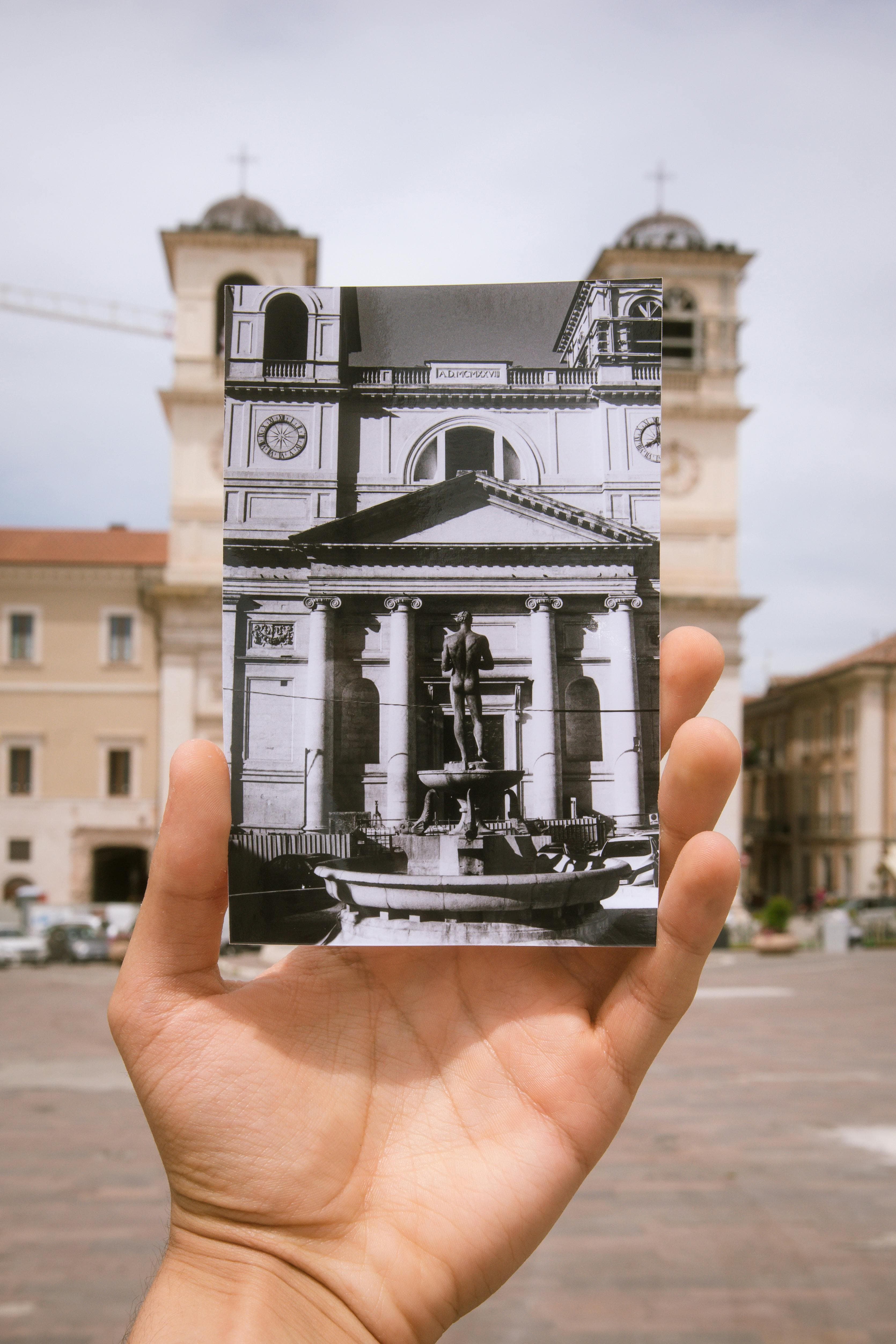 Comparison of a black and white photo with a new building.