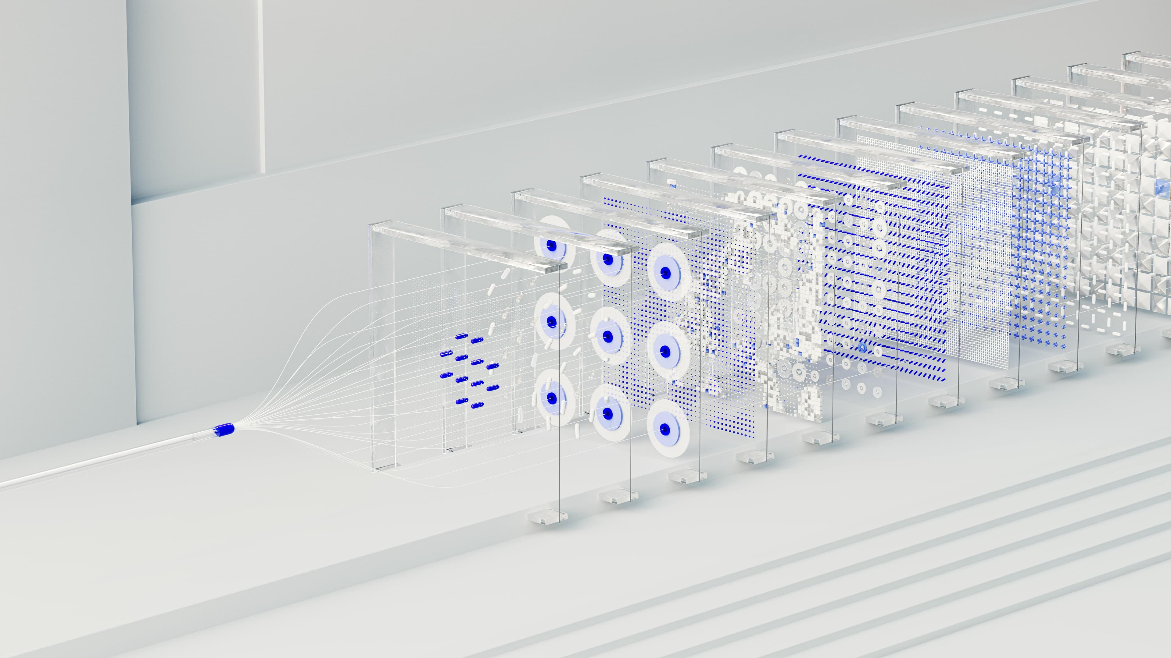Layers of glass with uniform blue circuits on them.
